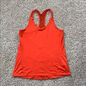 Athleta red tank with reflective detail